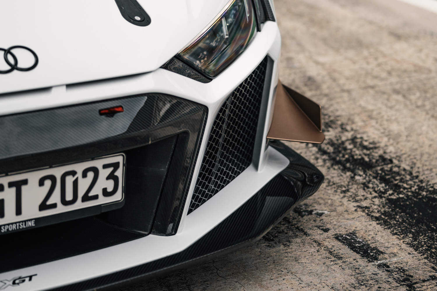 Close-up of one side of the front of a black and white XGT