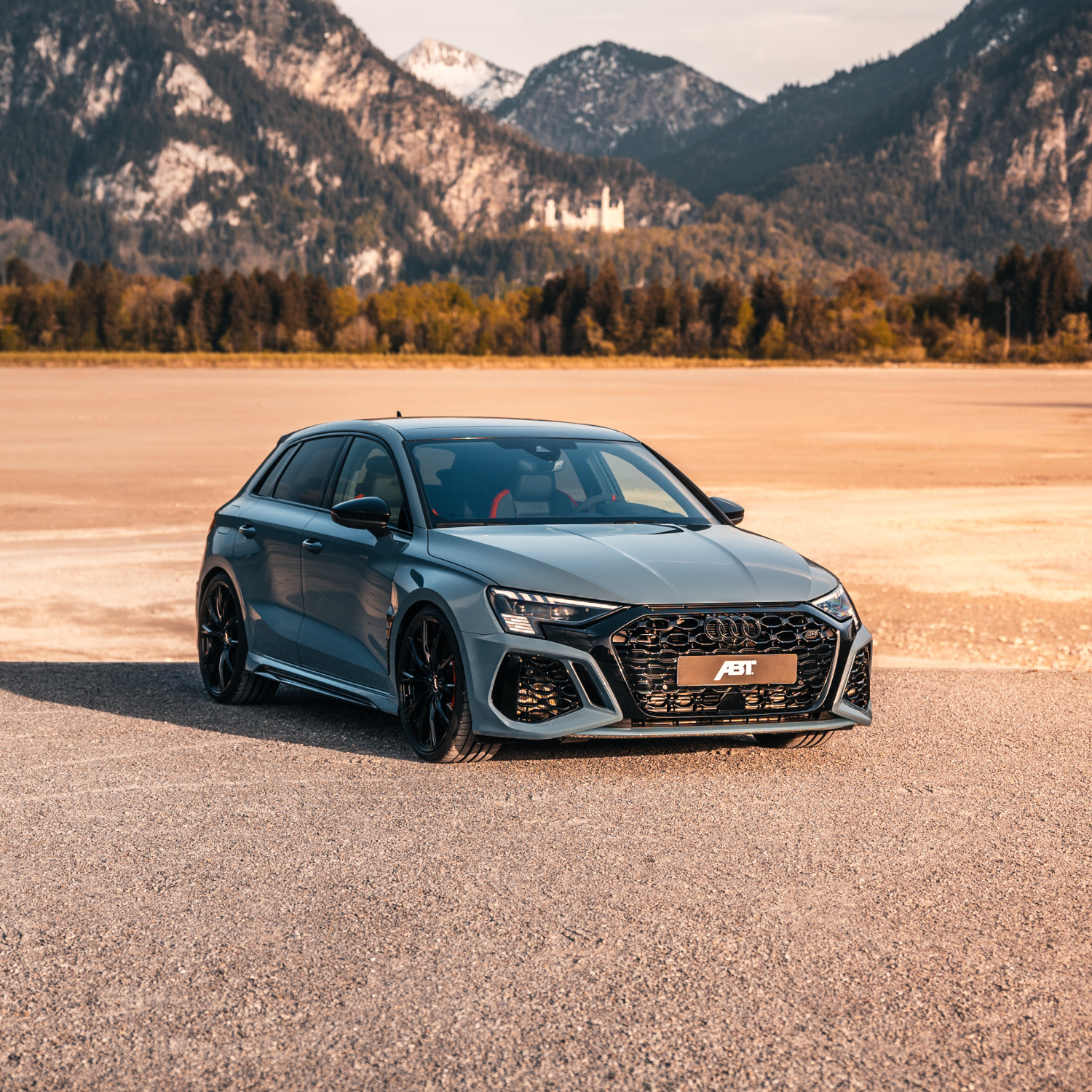Blue RS3-S from the side front view in front of a mountain panorama