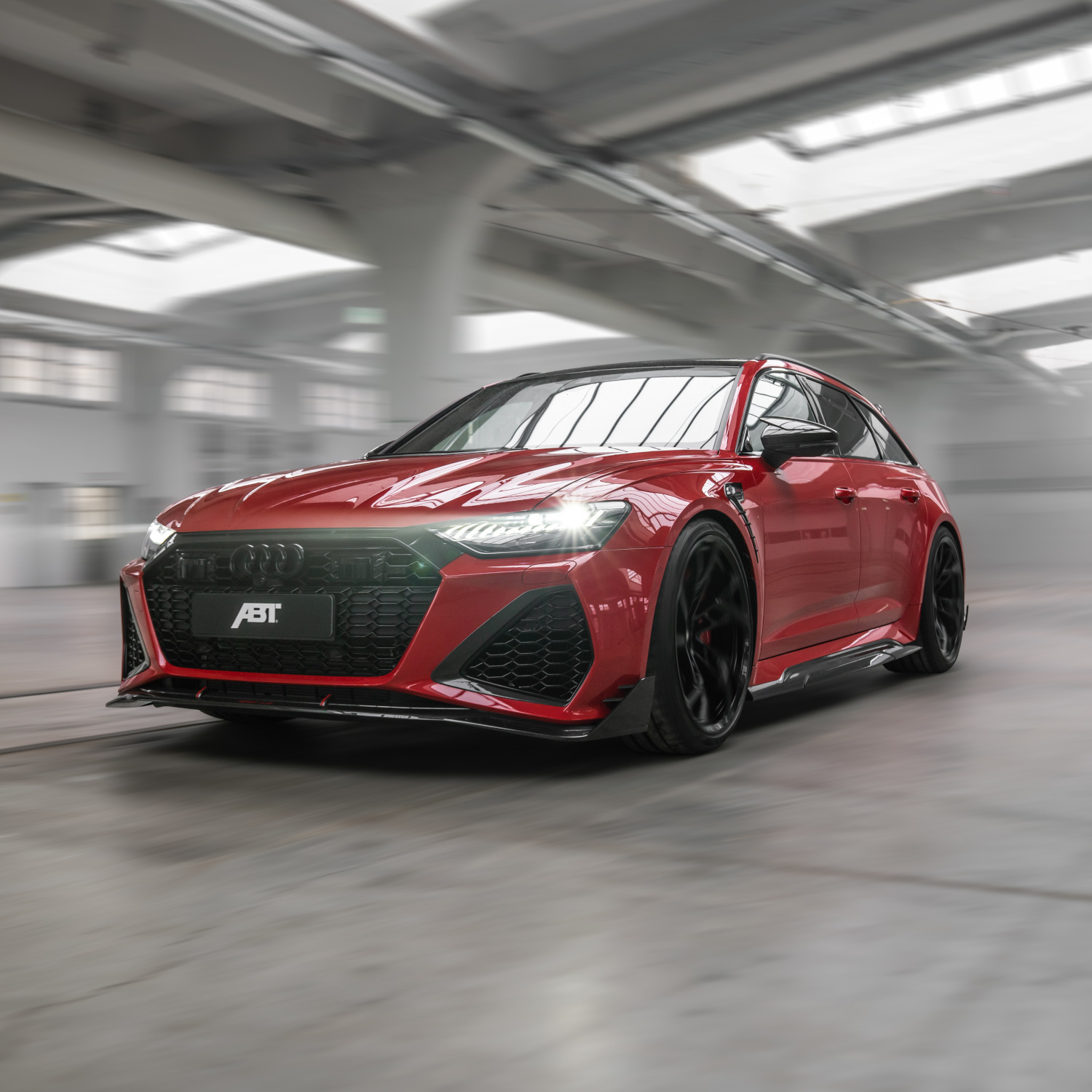 Red RS6-LE from the side front view in the hall