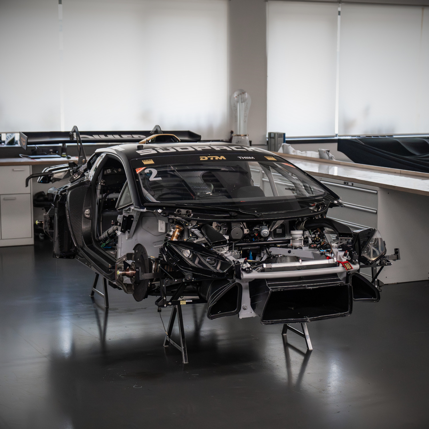 View of a jacked-up DTM Lambo