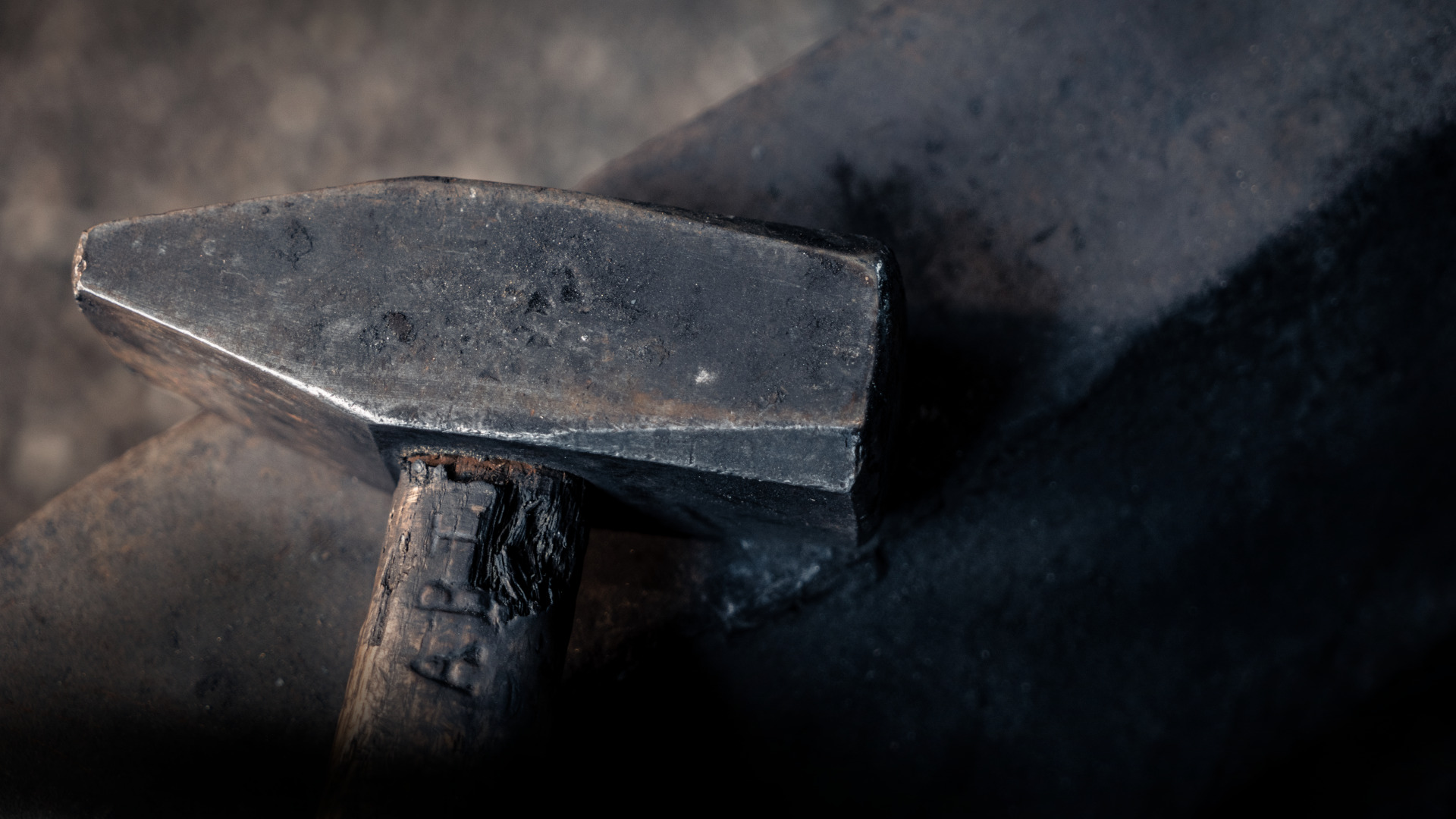 Blacksmith's hammer on anvil