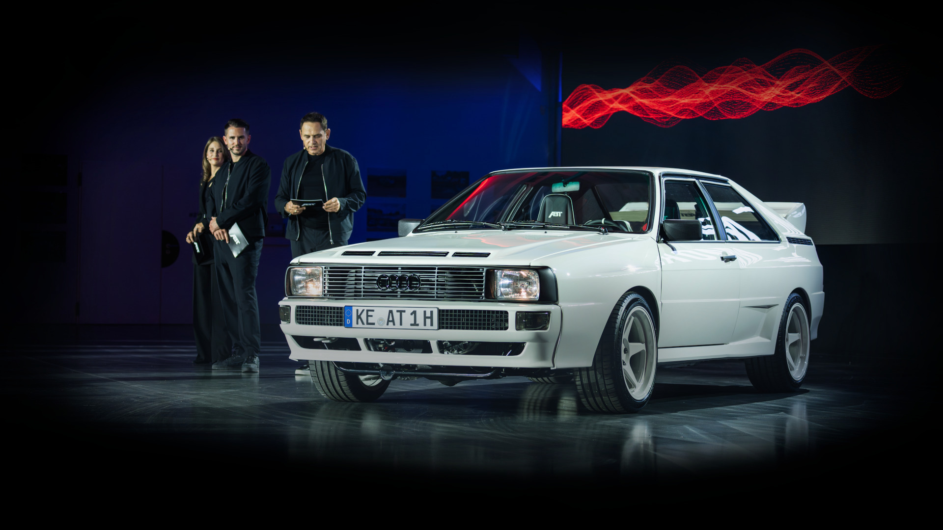 Hans-Jürgen, Daniel and Marina Abt next to the original Quattro at the Friends of Abt event